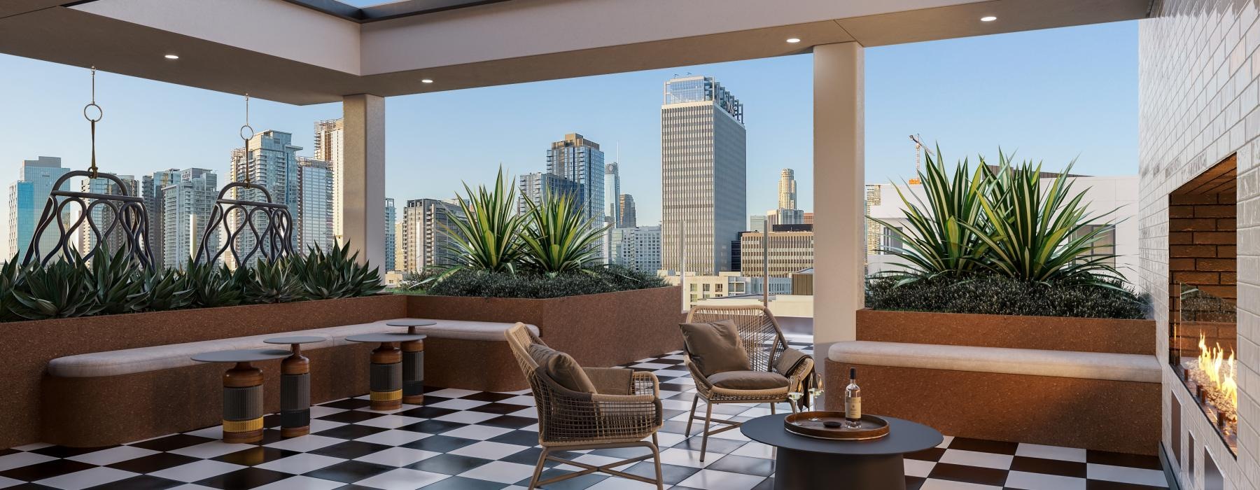 a room with a large window and a table with chairs and a view of a city